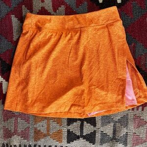 OUTDOOR VOICES Orange & pink tennis skirt / skort